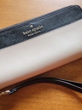 Kate Spade colorblock wristlet pouch in black and creme